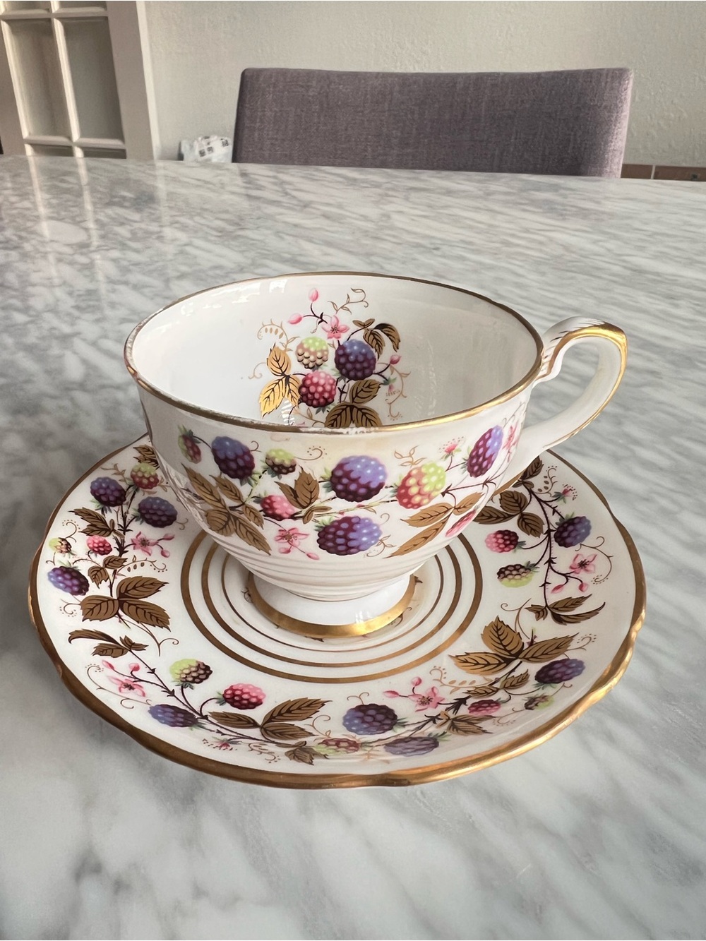 Vintage English Floral Berry Teacup and Saucer in White and Gold